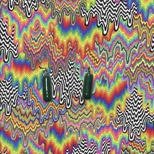 Handmade green grow dinosaur pill earrings!